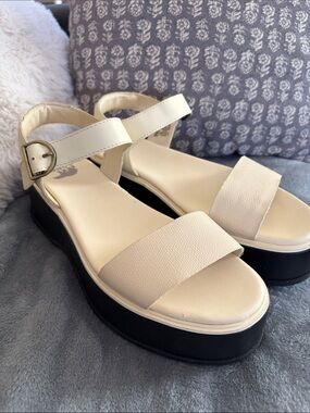 Sorel Cream Platform Sandals with Black Sole